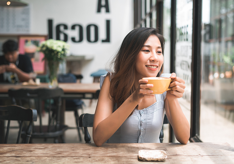 woman drinking coffee