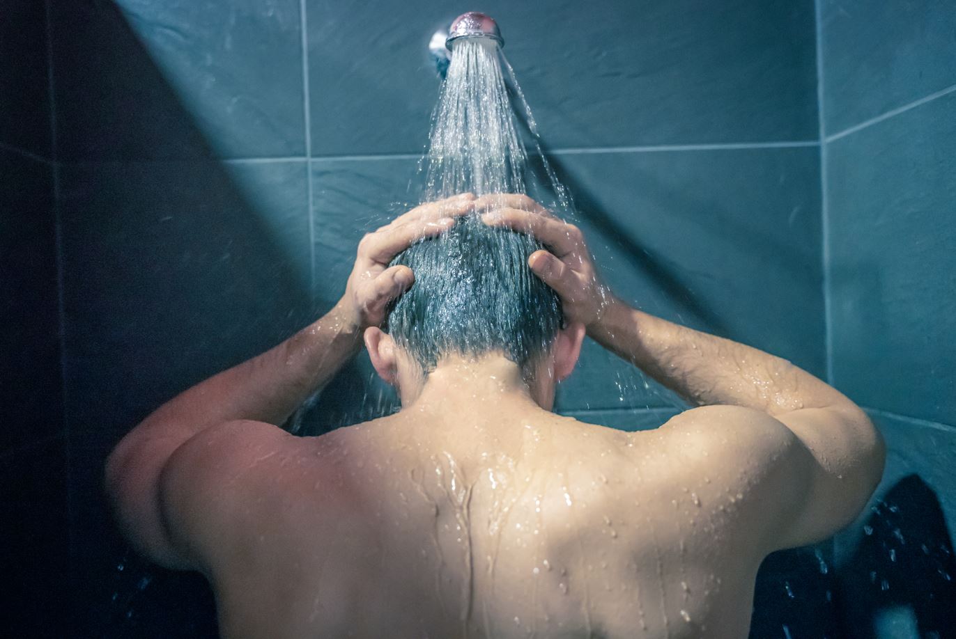 man taking a shower