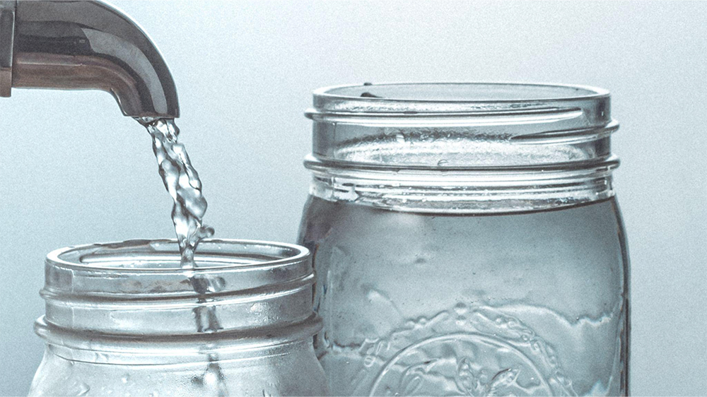 tap water into a glass pot