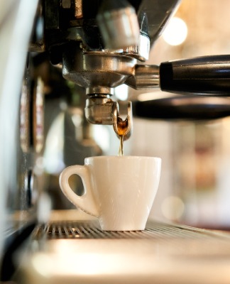 coffee dripping into a cup